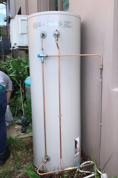 Hot water storage tank with new copper pipework by HJA Plumbing
